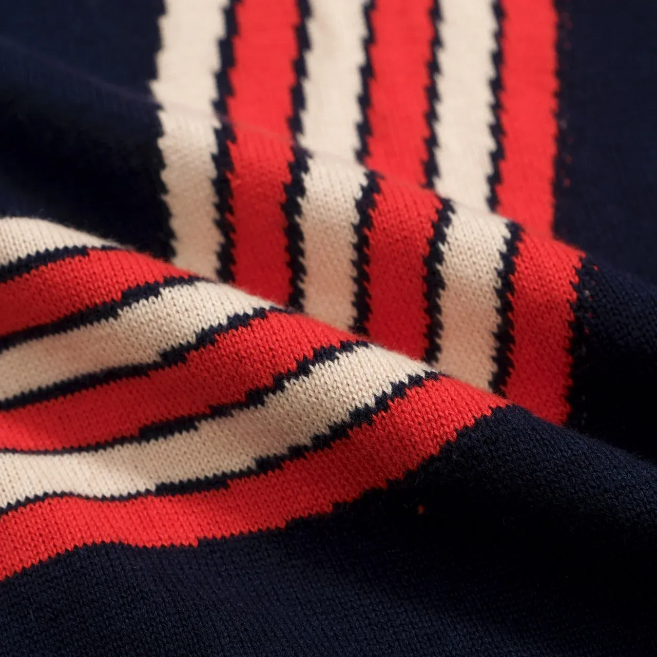 Men’s Retro 1970s Daisy Knit Polo Shirt – Vintage Navy with Red Striped Flower Graphic - Image 2